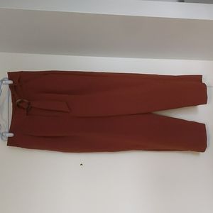 Topshop size 6 cropped dark salmon trousers, worn a few times, good condition.